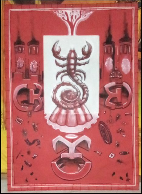 A monochrome red painting of a large scorpion with a spiralling tail on a white panel, flanked by dark towers and stylised CB letterforms — a barbed portrait of Cottbus itself.