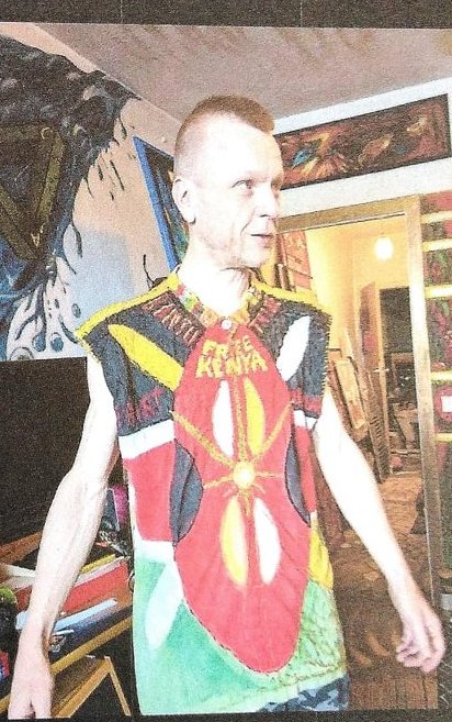 Wearing his Free Kenya shirt art